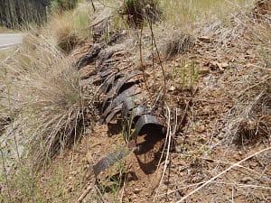 Bonito pipeline laying on ground on hillside.